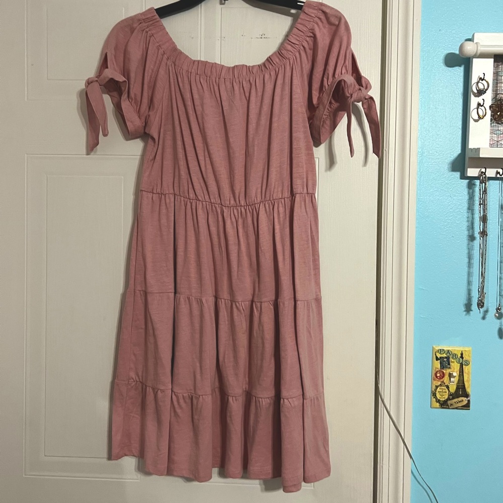 A cute, pink, flowy, above the knee length dress